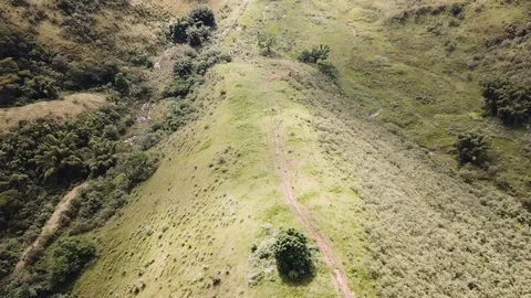 A small moutain with ox paths Stock Footage 90228334