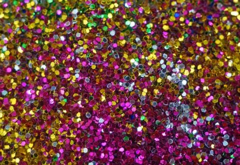 Small multicolored sequins as background Stock Photos