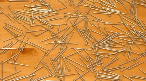 Small nails and a bolt Stock Footage 62687994