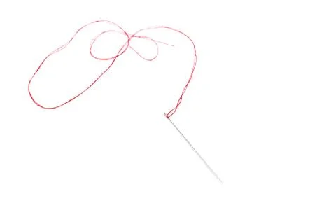 Small needle with thread isolated over the white background Stock Photos