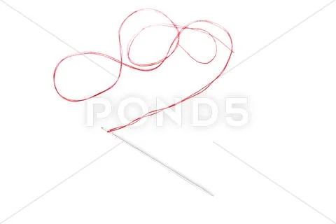 Small needle with thread isolated over the white background Stock Photos