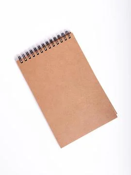 Small notebook on a white isolated background. Stock Photos
