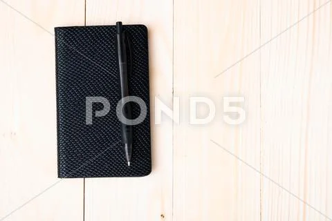 Small notepad with pen Stock Photos