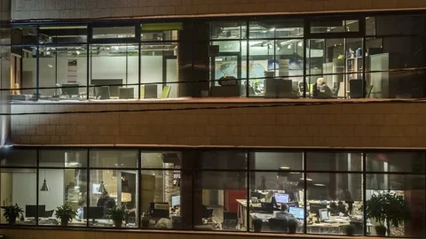 A small number of office workers who need to be present at the workplace and  Stock Footage 143147667