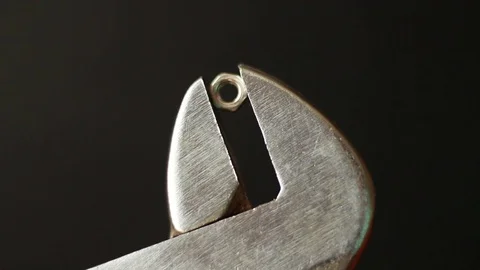 Small nut clamped with spanner Vídeo Stock 75629106
