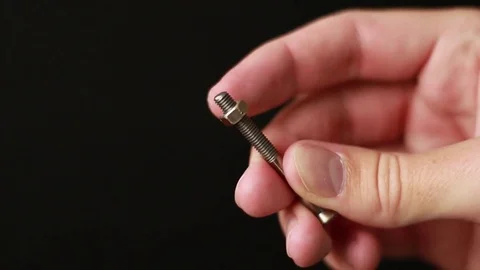 Small nut over the bolt 動画素材 75629131