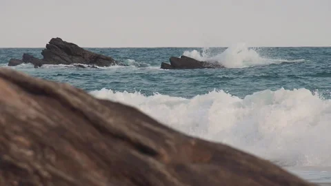 Small ocean waves hit the coastal rocks Stock Footage 153045253