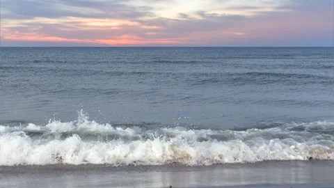 Small ocean waves with horizon and beautiful sunset sky - maritime background Stock Footage 143483358