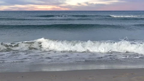 Small ocean waves with horizon and beautiful sunset sky - maritime background Stock Footage 143495678