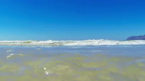 Small ocean waves running into camera Stock Footage 22226858