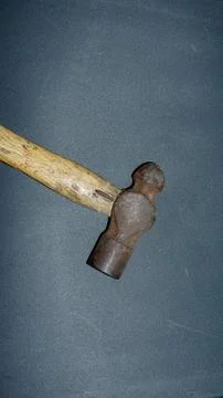 A small old iron hammer Stock Photos