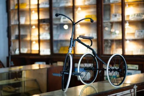Small Old rusty kid bicycle retro style vintage Stock Photos