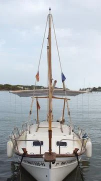 Small old ship moored in the harbor Stock Photos