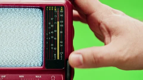 Small old television with grey interference screen on chroma green background Stock Footage 169114344