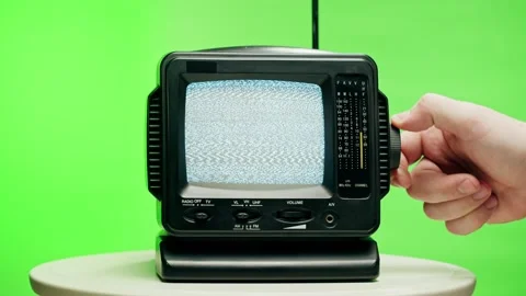 Small old television with grey interference screen on chroma green background Stock-Footage 169195212