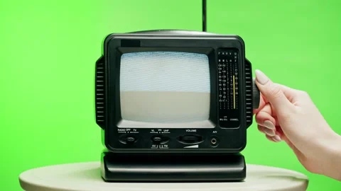 Small old television with grey interference screen on chroma green background Stock Footage 169195237
