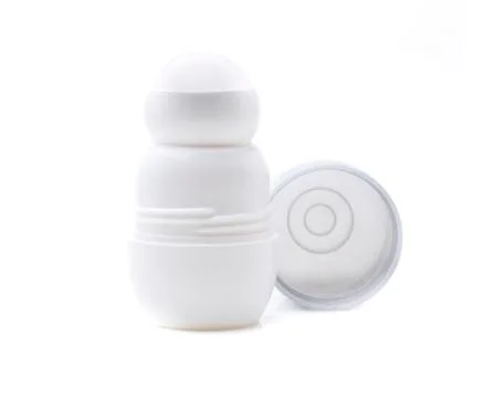 A small open white roll-on deodorant Stock Photos