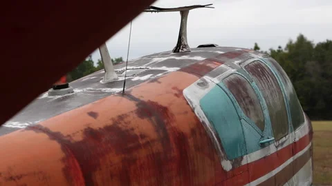 Small Orange Abandoned Plane Tracking Stock-Footage 147005598
