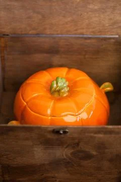 Small orange ceramic pumpkin sugar-bowl. For pumpkin porridge Stock Photos