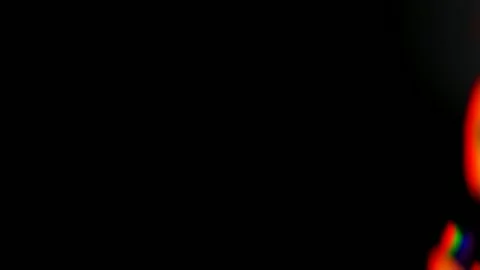 Small Orange Flame Flickering on Right Edge Black Background Copy Space Stock-Footage 347788668