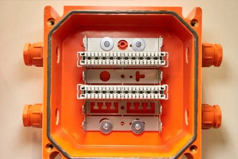 Small orange interface terminal blocks with buttons. Foto stock
