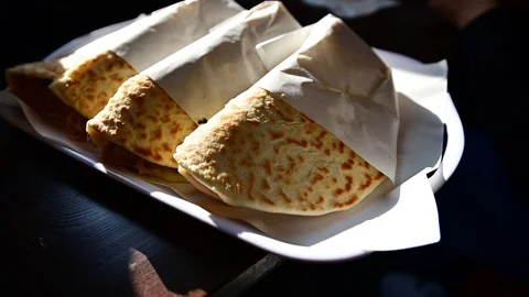 Small overview of a tray of piadine from Romagna (Italy). It is possible to see Stock Footage 122704287