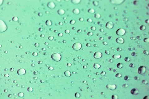 Small oxygen bubbles under water. Clear transparent liquid rain drops background Stock-Fotos