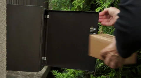 Small package in mailbox Stock Footage 53439622