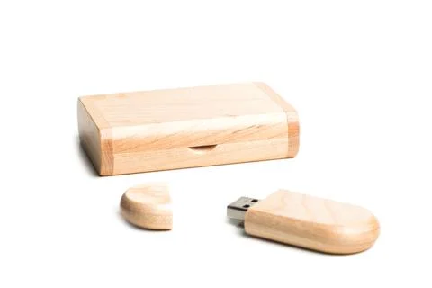 Small packaging for USB-drive from light wood. Wooden box with USB-storage .. Stock Photos