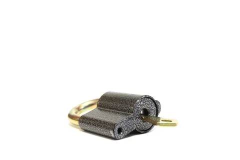 A small padlock on white background Stock Photos
