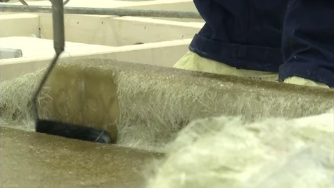 Small paint roller applying fiberglass Stock Footage 72143582