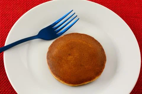 Small pancake sandwich with raspberry jam filling Stock Photos