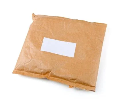 Small paper post parcel with blank label 스톡 사진
