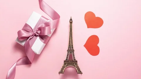 Small Paris Eiffel Towel with gift box and red hearts Stock Footage 123808937