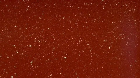 Small particles move randomly on a colored background. Stock Footage 108851556