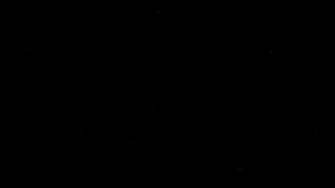 Small particles move to the right in the dark. Stock Footage 321961738