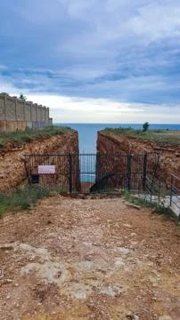 A small passage between steep cliffs Stock Photos