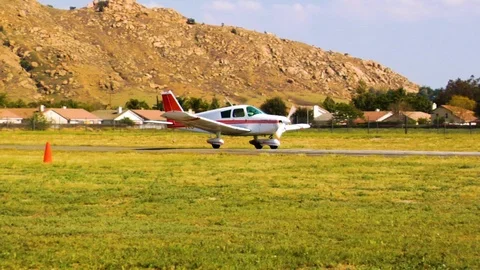 Small Passenger Plane Lands and Takes Off Stock Footage 90318396
