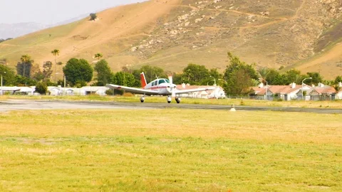 Small Passenger Plane Lands and Takes Off Stock Footage 90318785
