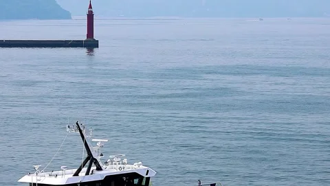 Small Passenger Ship Departing from Hiroshima Port into Seto Inland Sea, 4K 库存影片 340830501