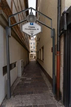 Small path between old houses Stock Photos
