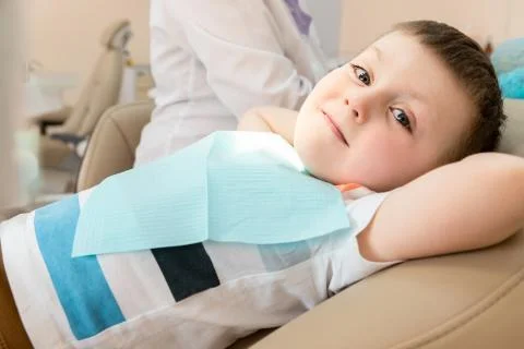 Small Patient at the Dentist. Checking the Teeth at the Child. Stock Photos