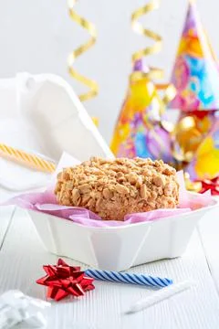 Small peanut cake in a box. Stock Photos