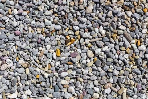 Small pebbles background Stock Photos