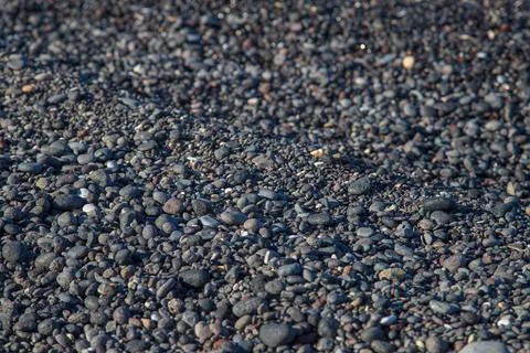 Small pebbles on a beach Stock Photos