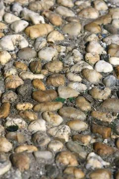 Small pebbles or rock background Stock Photos