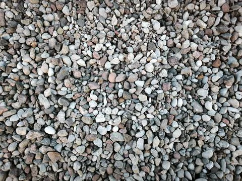 Small pebbles woven into a natural pattern Stock Photos