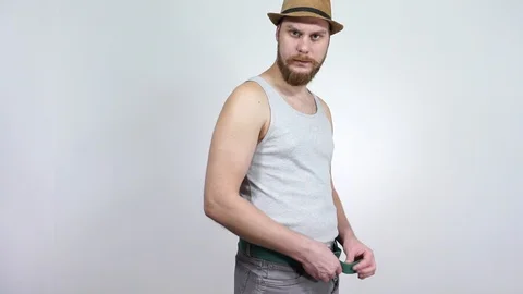 Small penis size problem for men.Looking for his erection to a magnifying glass. 動画素材 123165560