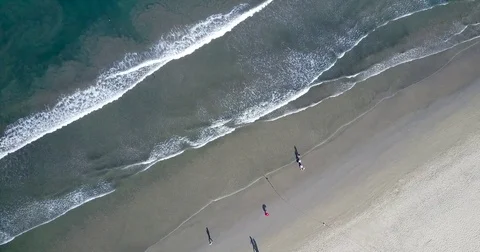 Small people at the beach Stock Footage 74715830