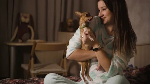 Small pet and its owner Stock Footage 147487992